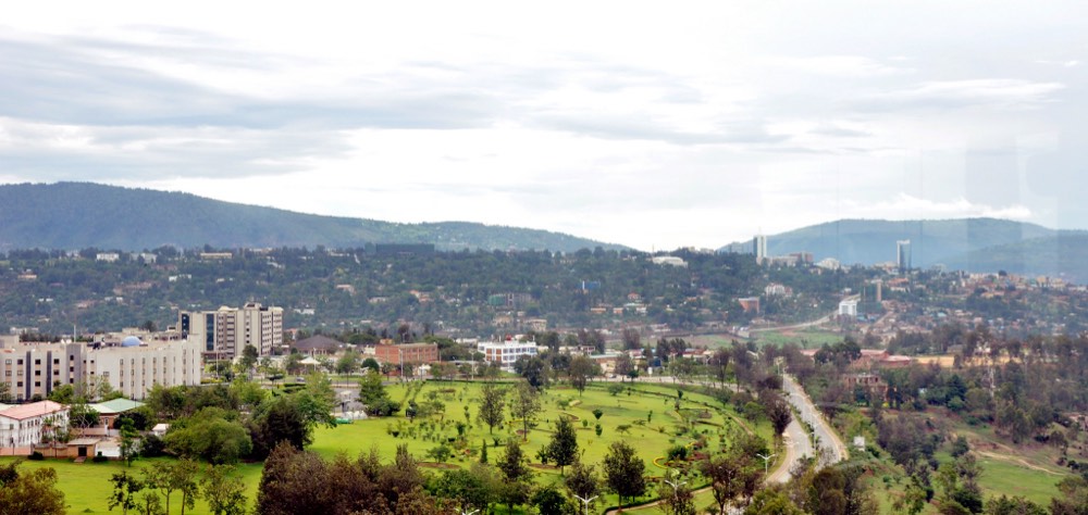 The downtown skyline of Kigali, Rwanda, with modern mid-rise towers above the city hills.